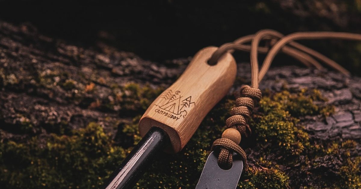 Flint and Steel Lying on Tree Bark · Free Stock Photo