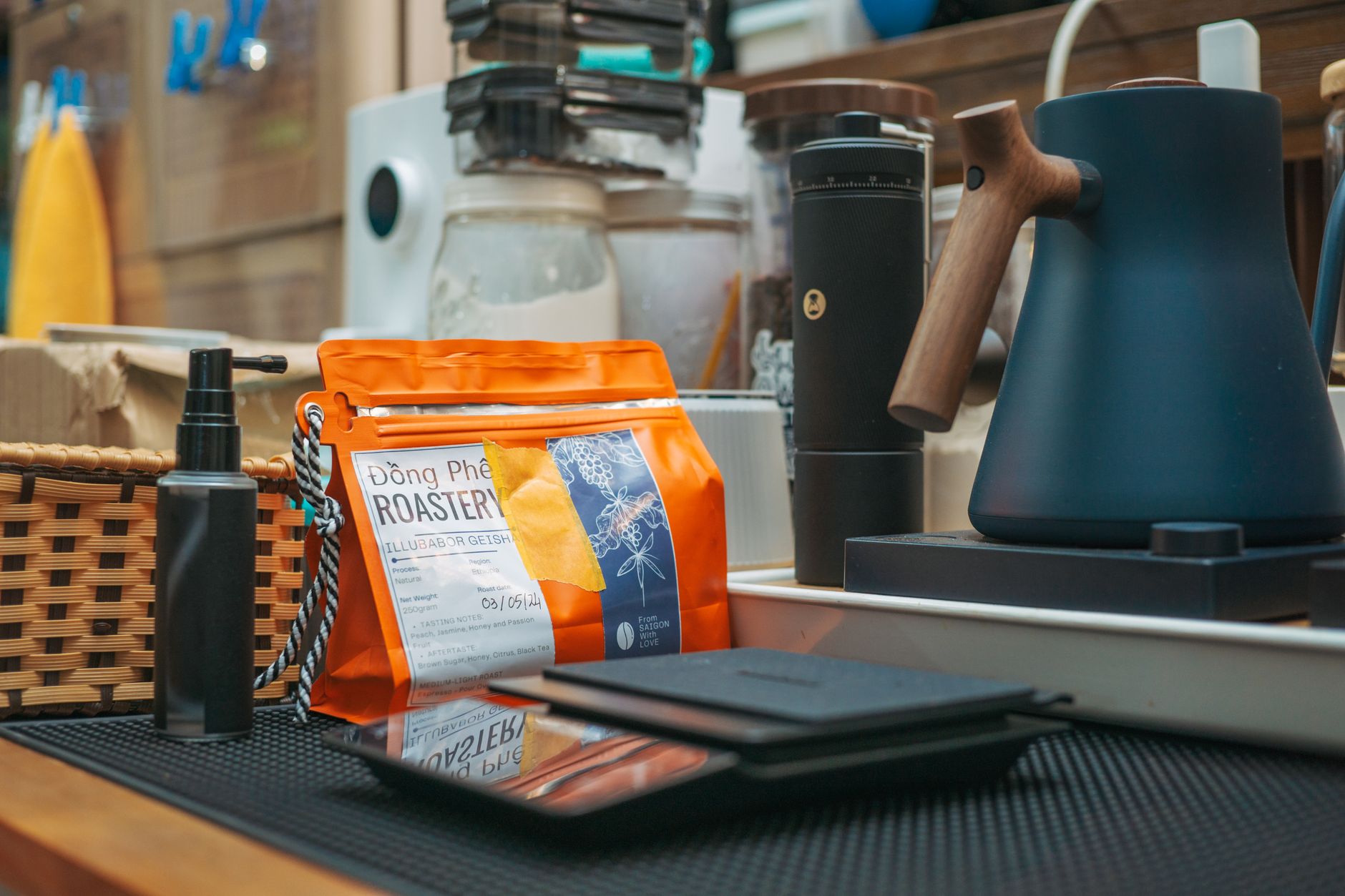 A stylish coffee brewing setup featuring Dong Phè Roastery coffee and modern equipment.