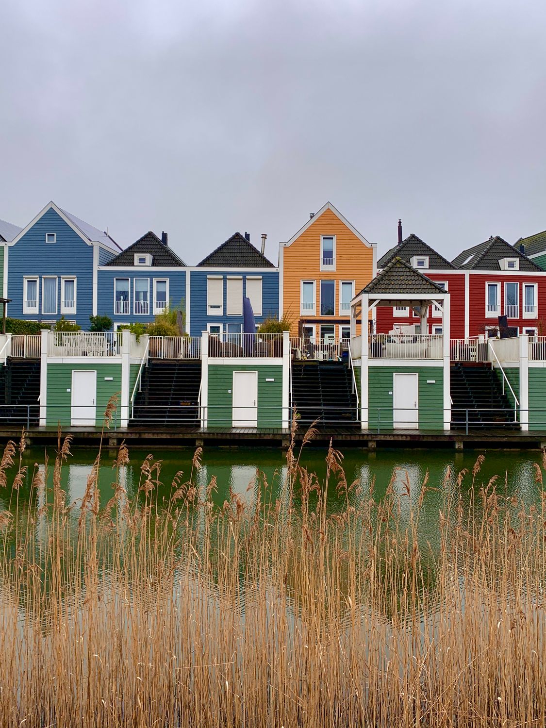 Colorful Narrow Dutch Houses Near Rietplas Lake In Houten In Colorful Narrow Dutch Houses Near Rietplas Lake In Houten In