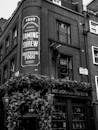A black and white photo of a pub