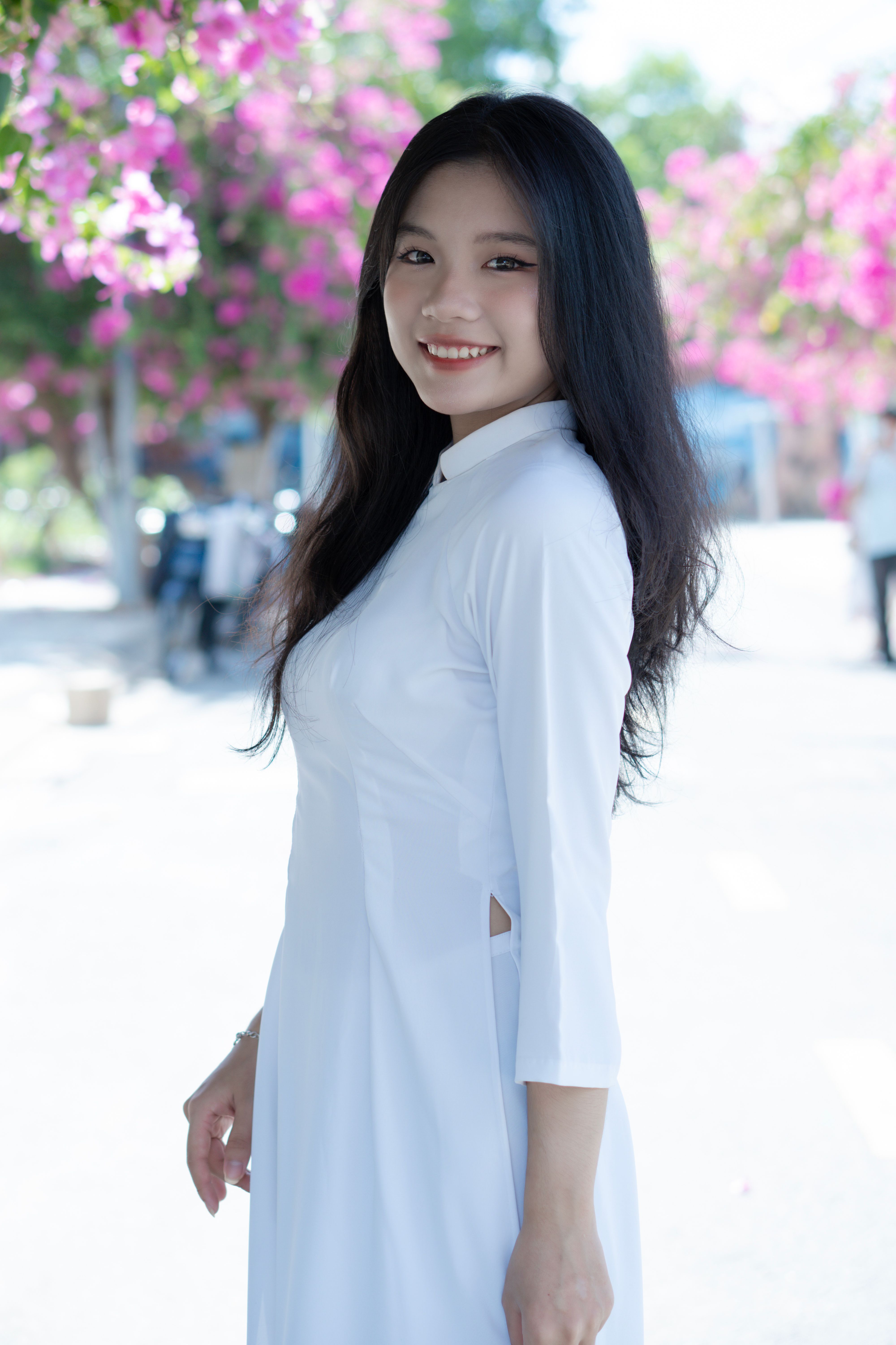 Portrait of Smiling Woman in Traditional Clothing · Free Stock Photo