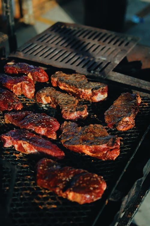 Selective Focus Photography Of Meat On Grill