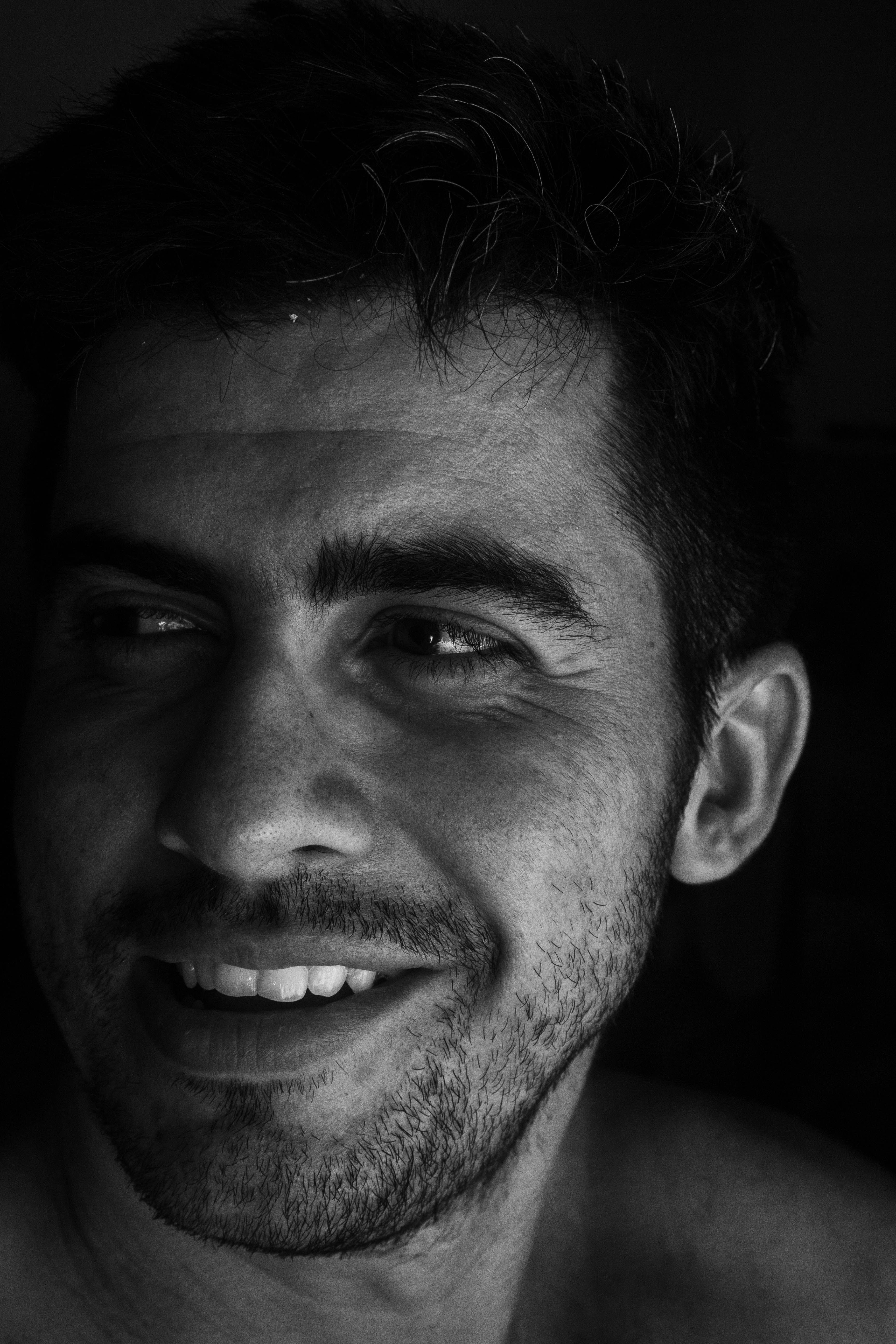 Black and White Portrait of a Man Smiling · Free Stock Photo