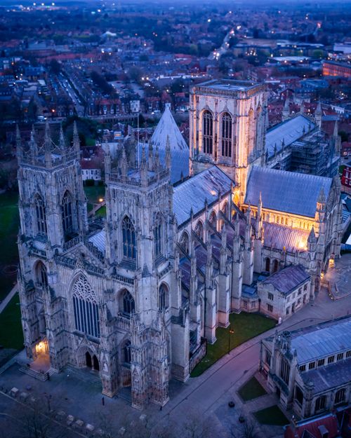 Free Twilight aerial shot of York Minster showcasing gothic architecture in England. Stock Photo