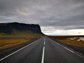 A road through the open fields in Iceland