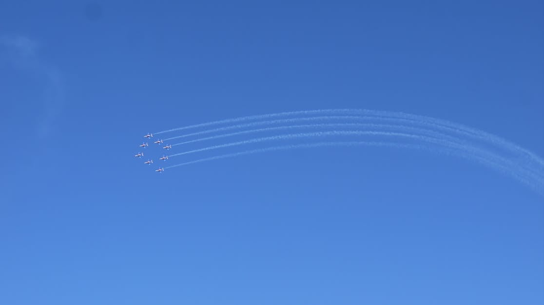 Aerial View of Vapor Trails in Blue Sky