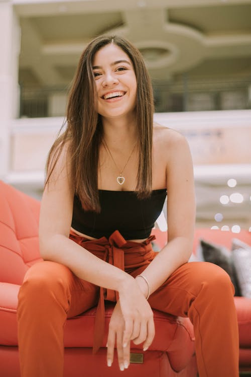 Shallow Focus Photo Of Woman In Black Strapless Top