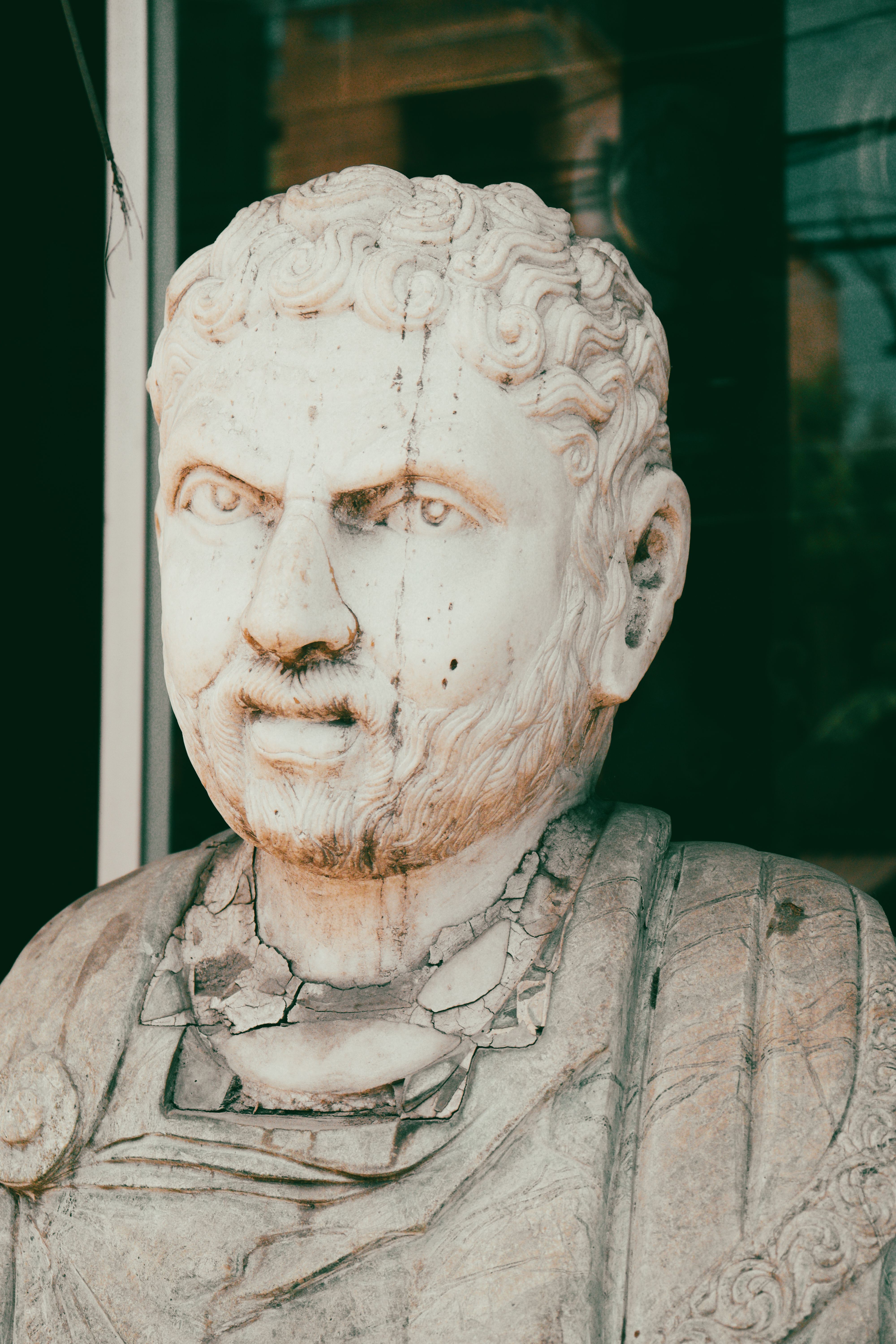 Detailed marble bust epitomizing classical art with intricate carving and expression.
