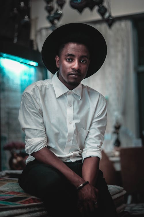 Man In White Button-up Long Sleeve Shirt