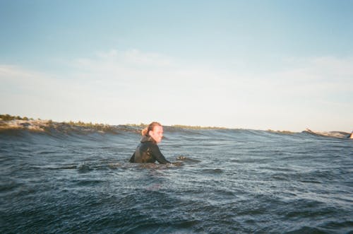 Person Swimming in a Body of Water