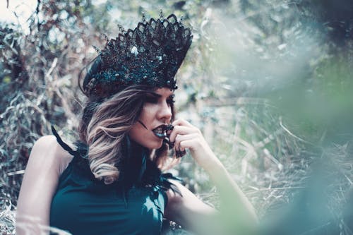 Woman Wearing Green Crown