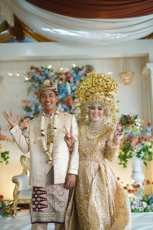 A man and woman in traditional wedding attire