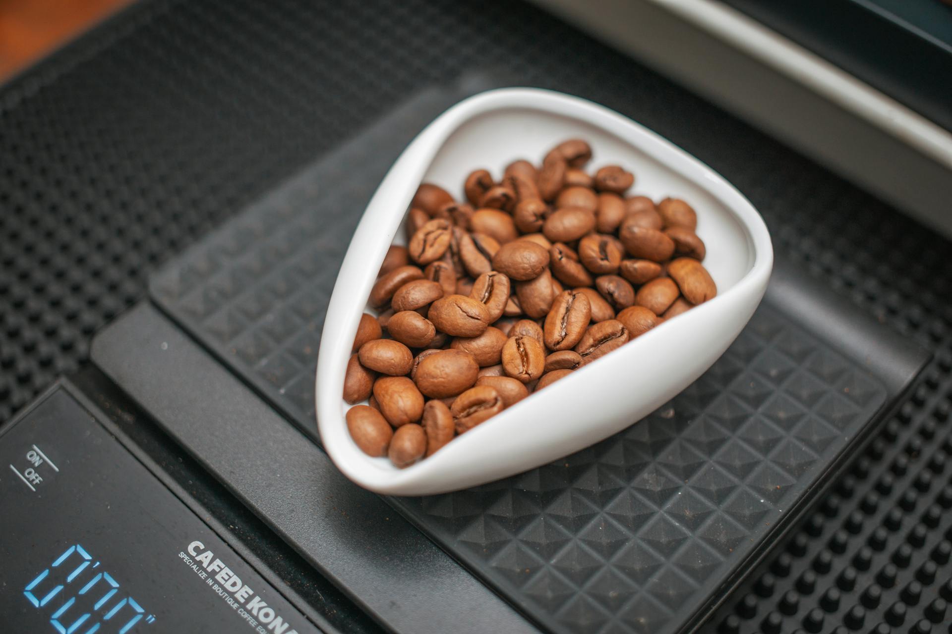 Close-up of Coffee Beans on a Kitchen Scale