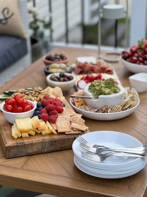 A table with a variety of food on it