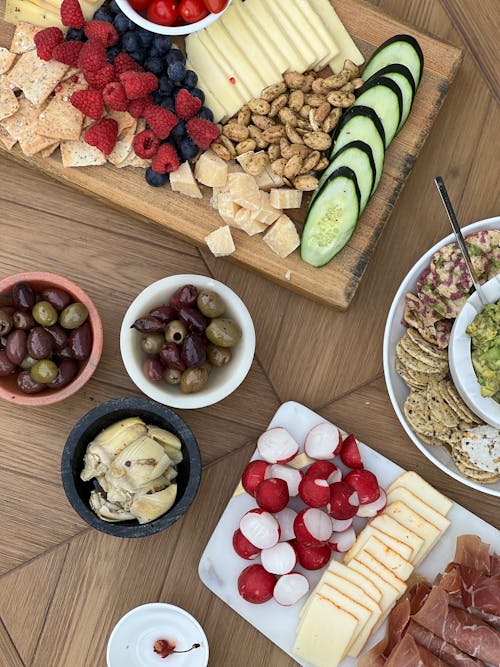 A table with a variety of foods and drinks