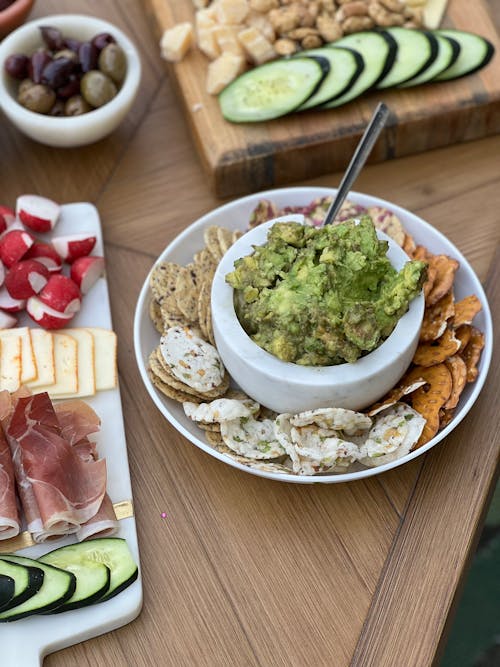 A table with a variety of foods and drinks