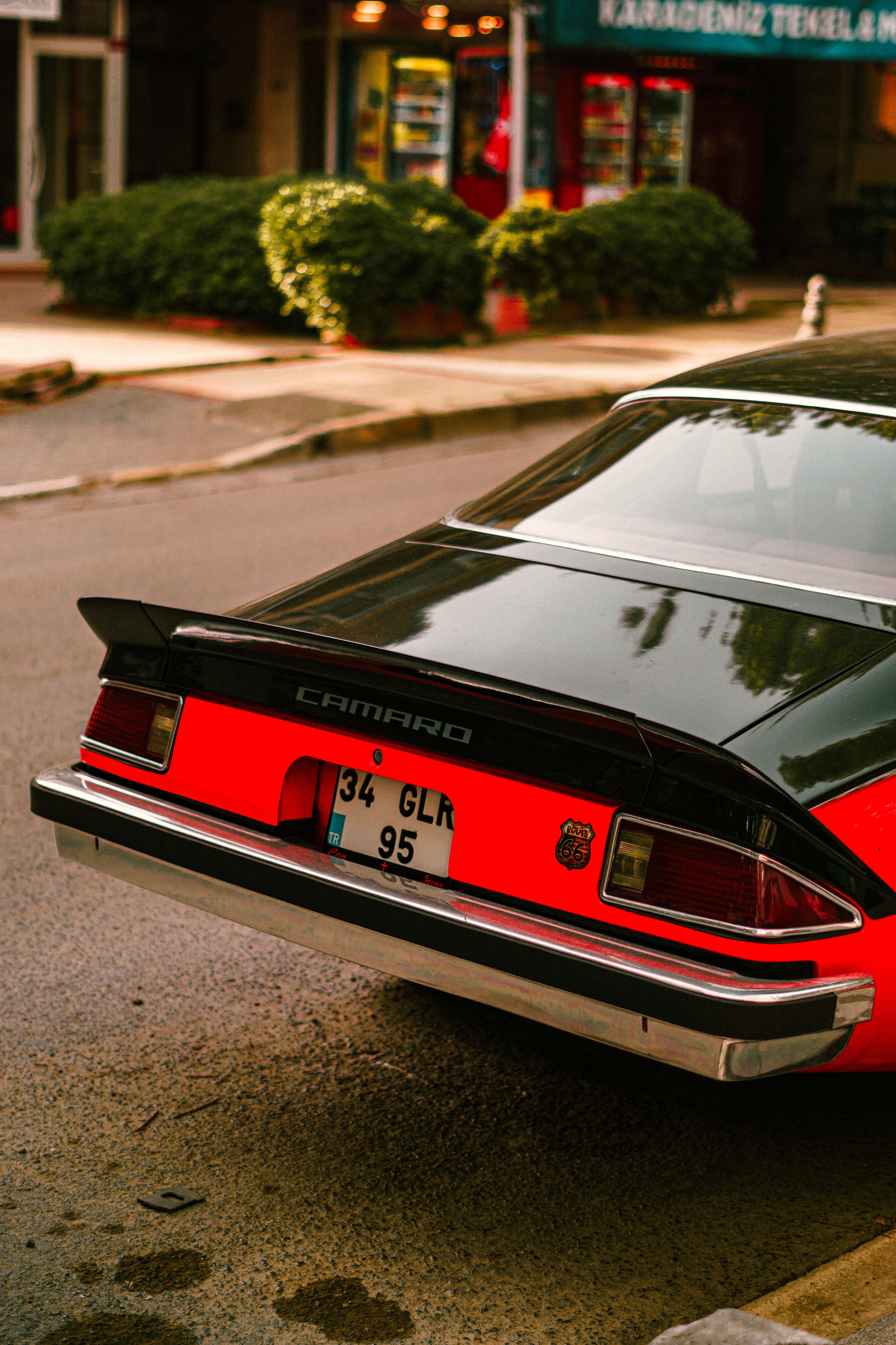 Back View of a Black and Red Chevrolet · Free Stock Photo