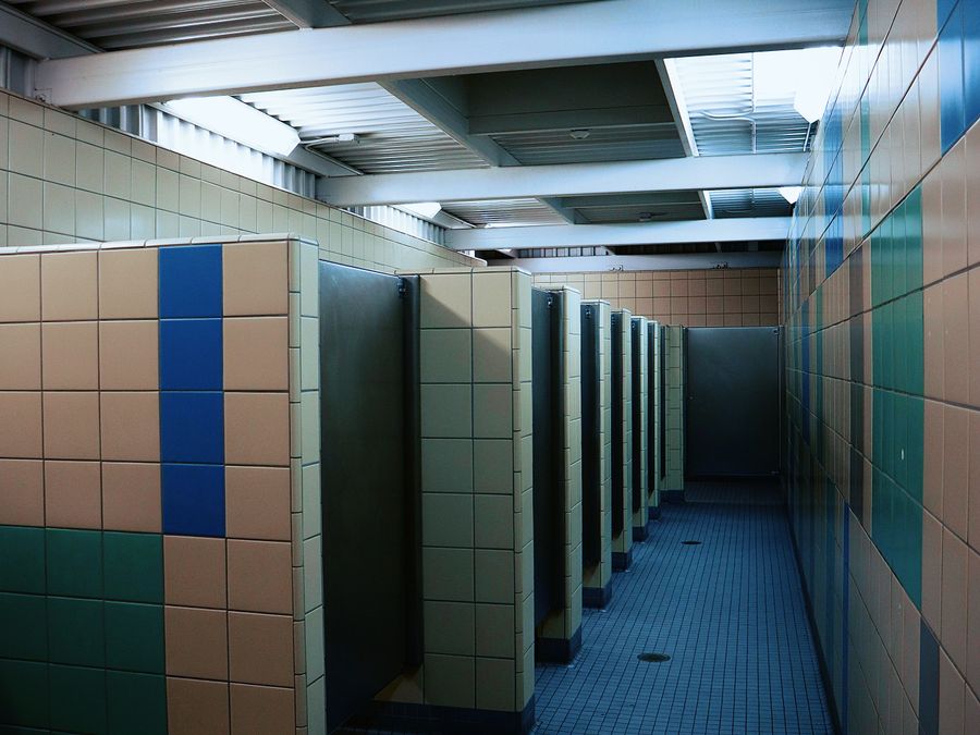 School washroom block with a row of cubicles