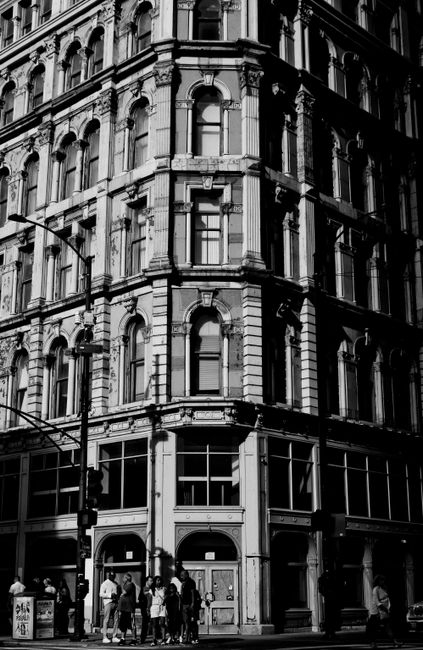 Classic black and white photo capturing the historic architecture of Chicago street corner.