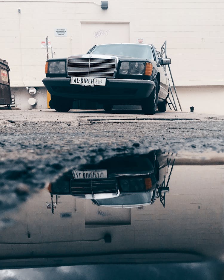 Reflection Photography Of Black Car