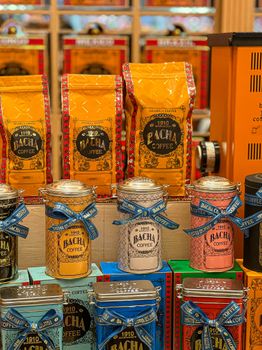 Vibrant display of coffee jars and bags in a retail store setting.