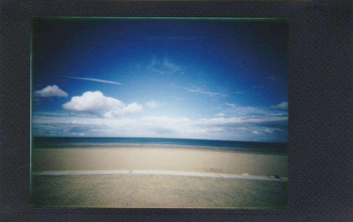 무료 푸른 하늘 아래 해변의 사진 스톡 사진