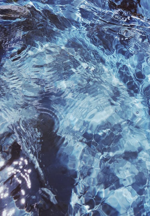 Kostnadsfria Kostnadsfri bild av blått vatten, krusningar, mönster Stock foto