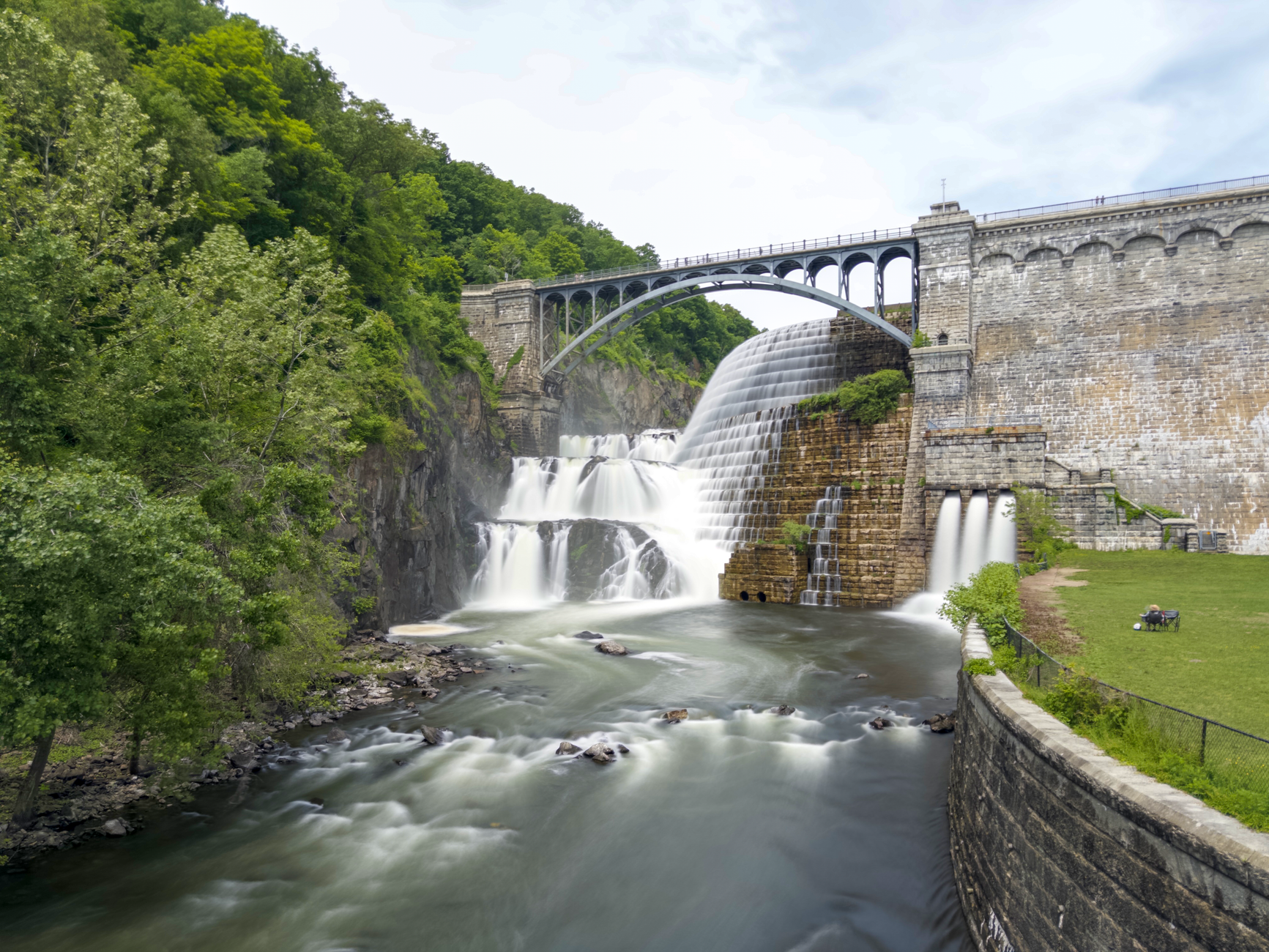 Breathtaking view of the Croton Dam and bridge surrounded by lush greenery in Croton-on-Hudson, NY.