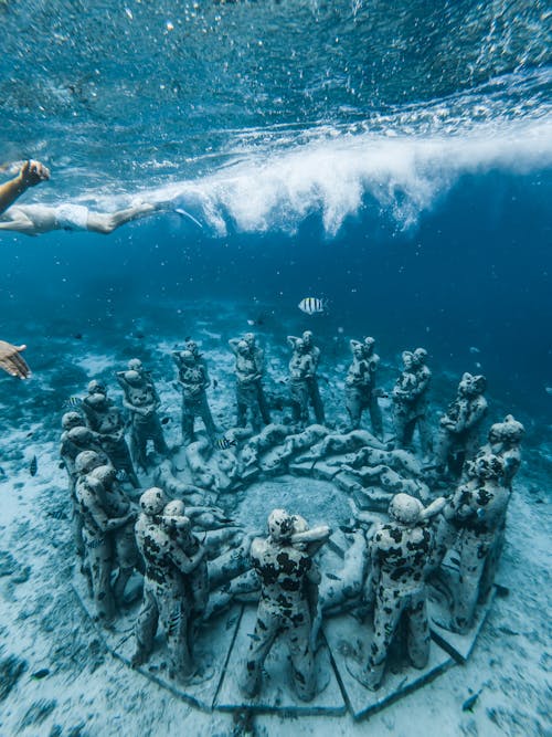 Grey Statues on Seabed 