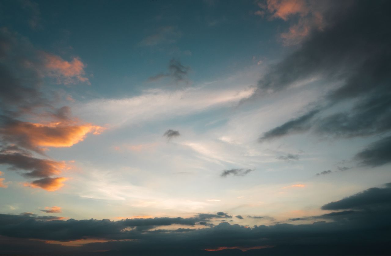 a serene and dramatic sunrise sky with colorful clouds in caraga phili