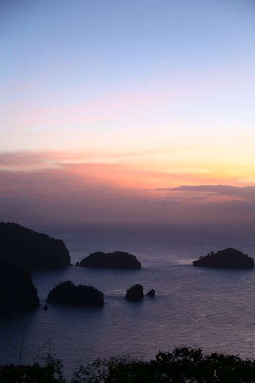 Foto De Silueta De Islas Durante La Hora Dorada