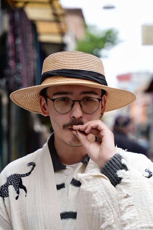 Portrait of Man in Hat Smoking