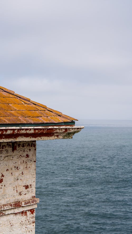 A view of the ocean from the top of a roof