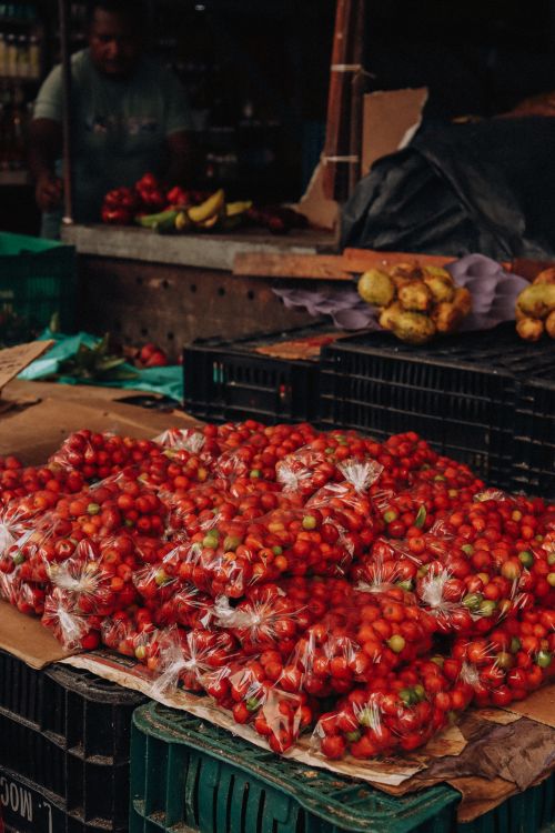 Free Bags of fresh chilli peppers at a bustling food market in Belém, Brazil. Stock Photo