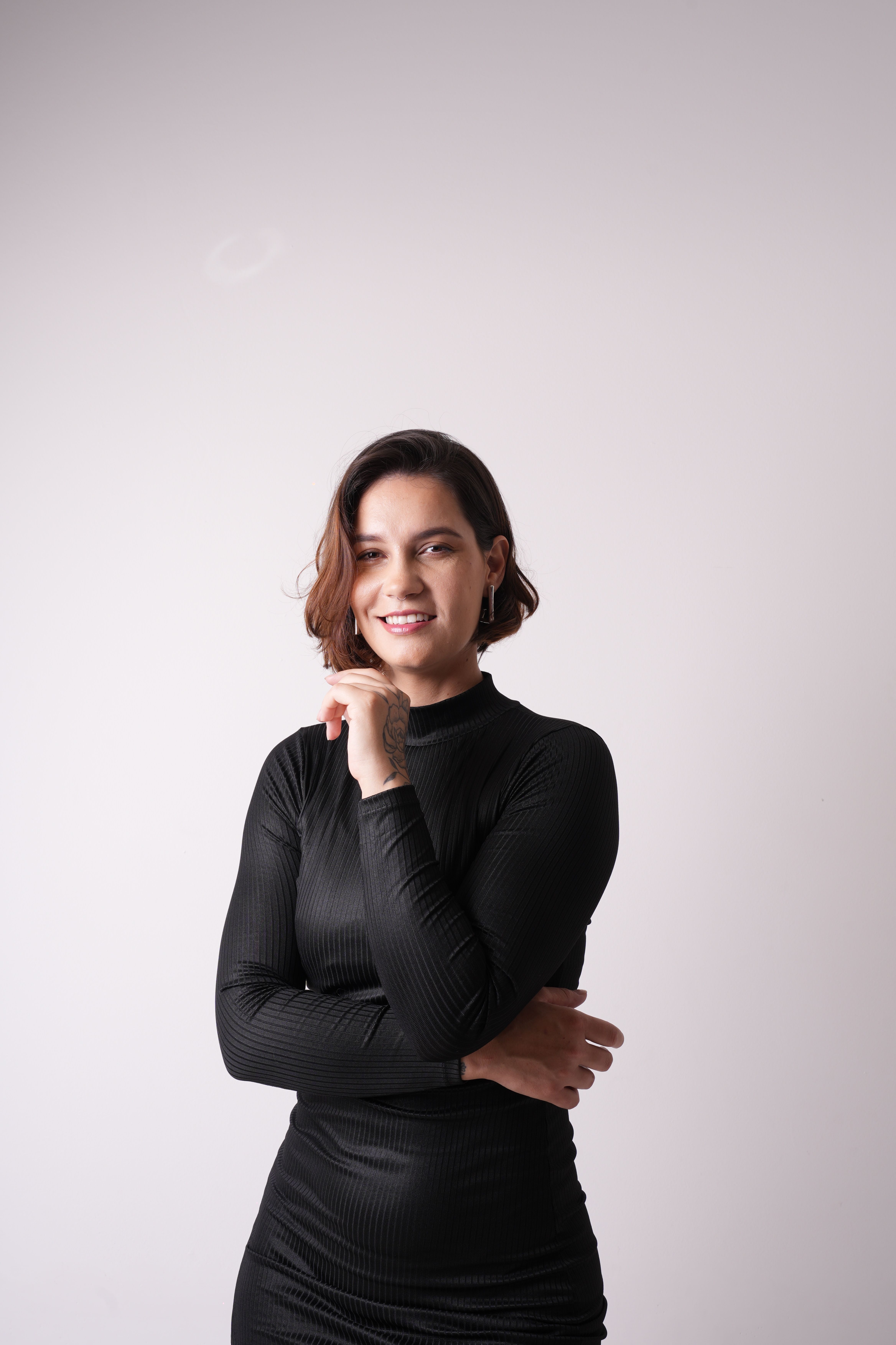 Brunette Woman in Black Dress Smiling · Free Stock Photo