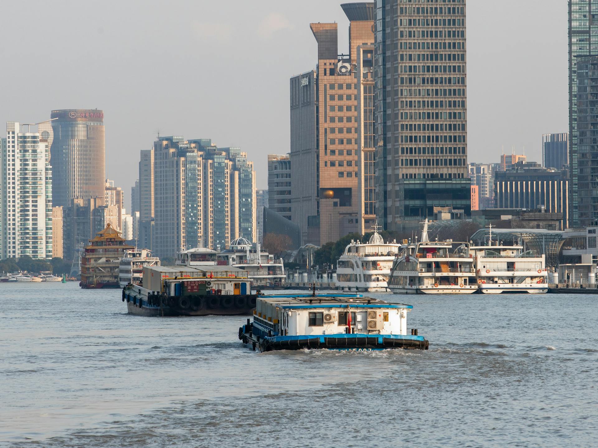 Cargo Barges and Cruise Ships on the Huangpu River