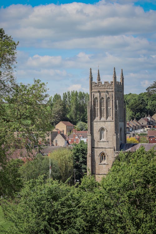 A view of a church tower from a hill