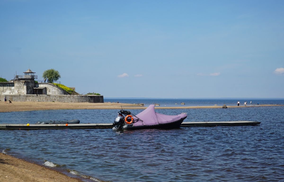Small motorboat on calm Baltic Sea waters