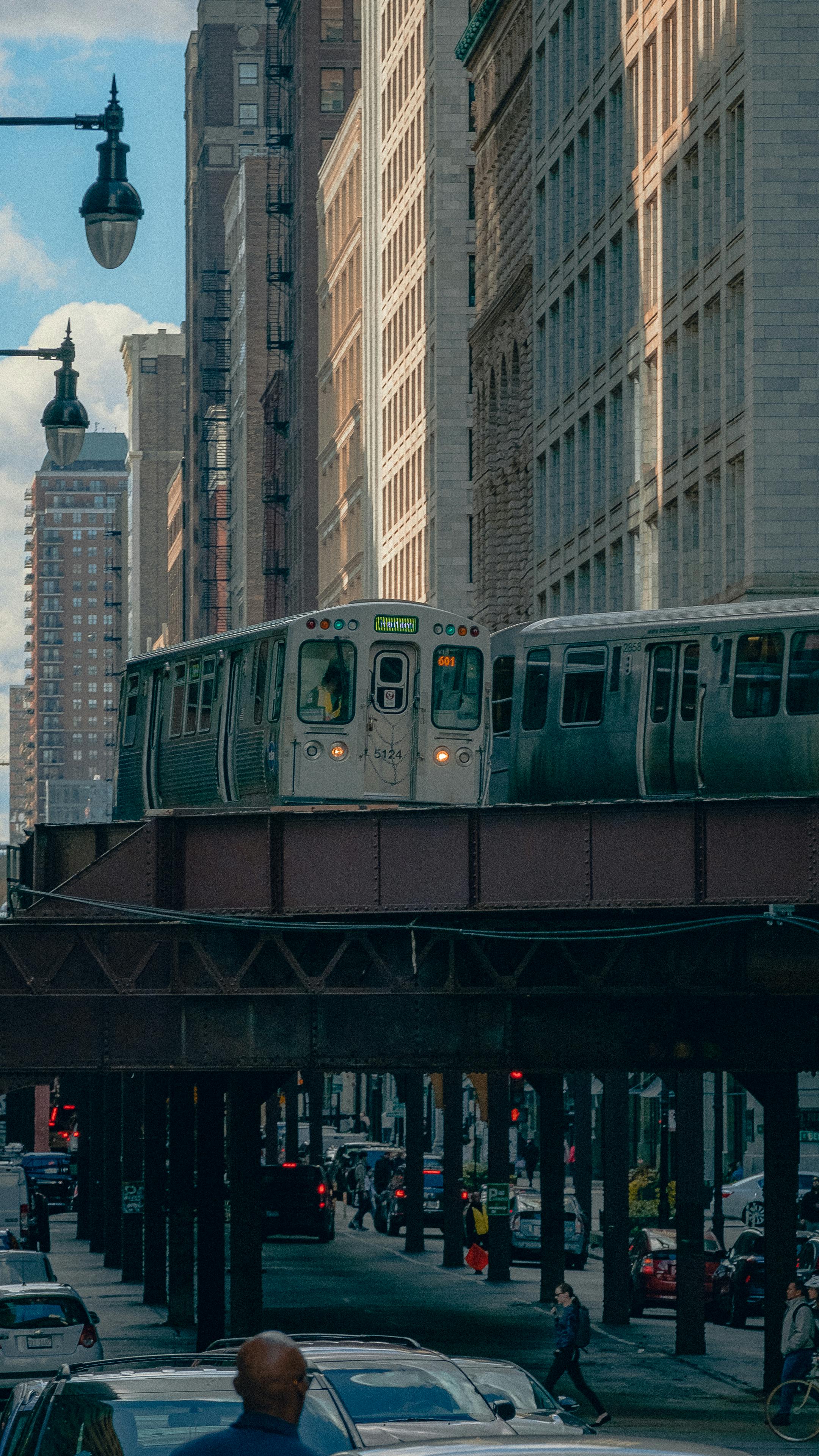 view of a busy street and the elevated railway downtown chicago illinois usa