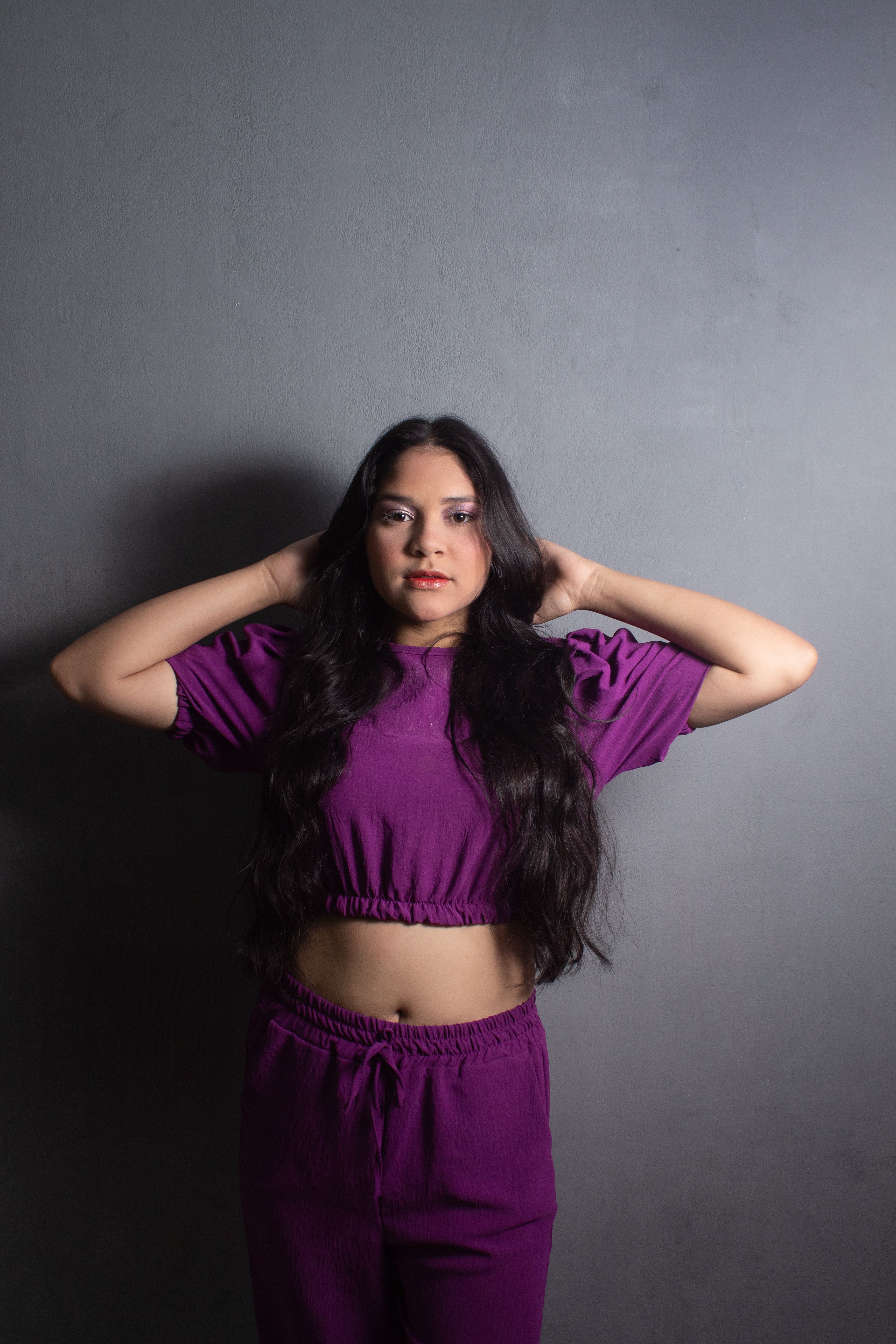 Young Woman in a Purple Tracksuit · Free Stock Photo