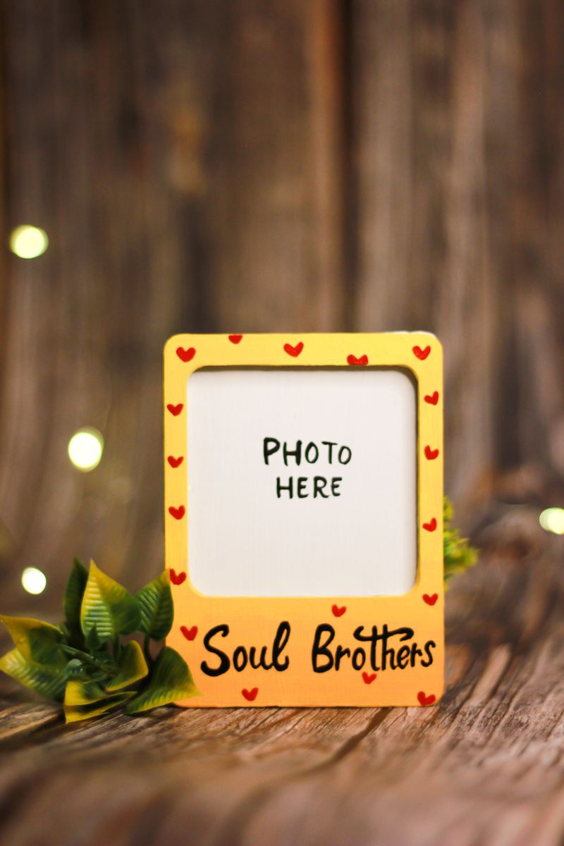 Yellow photo frame with hearts