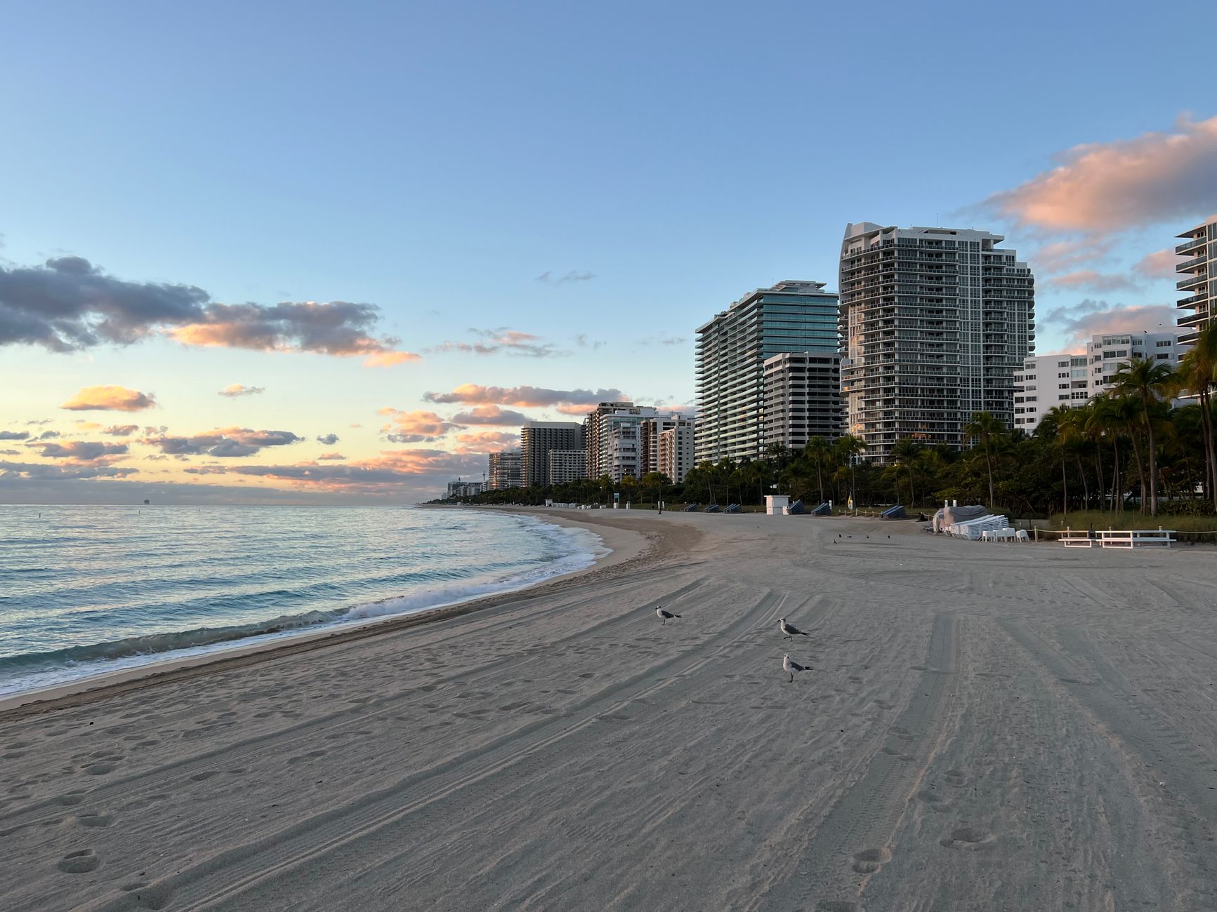 Turquoise ocean and pristine beach along Surfside and Bal Harbour coastline