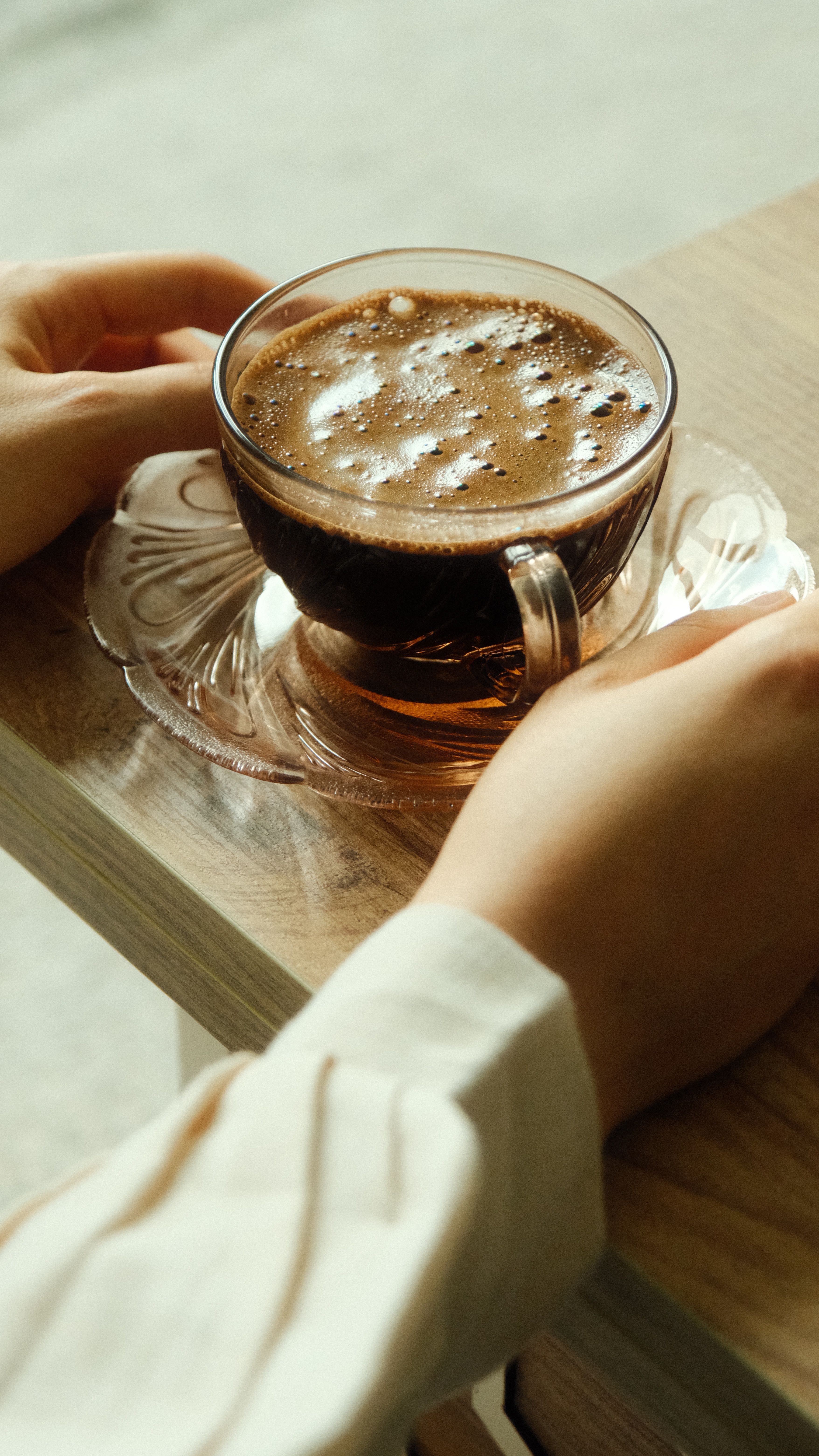 Woman Hands Holding Glass Cup of Coffee · Free Stock Photo
