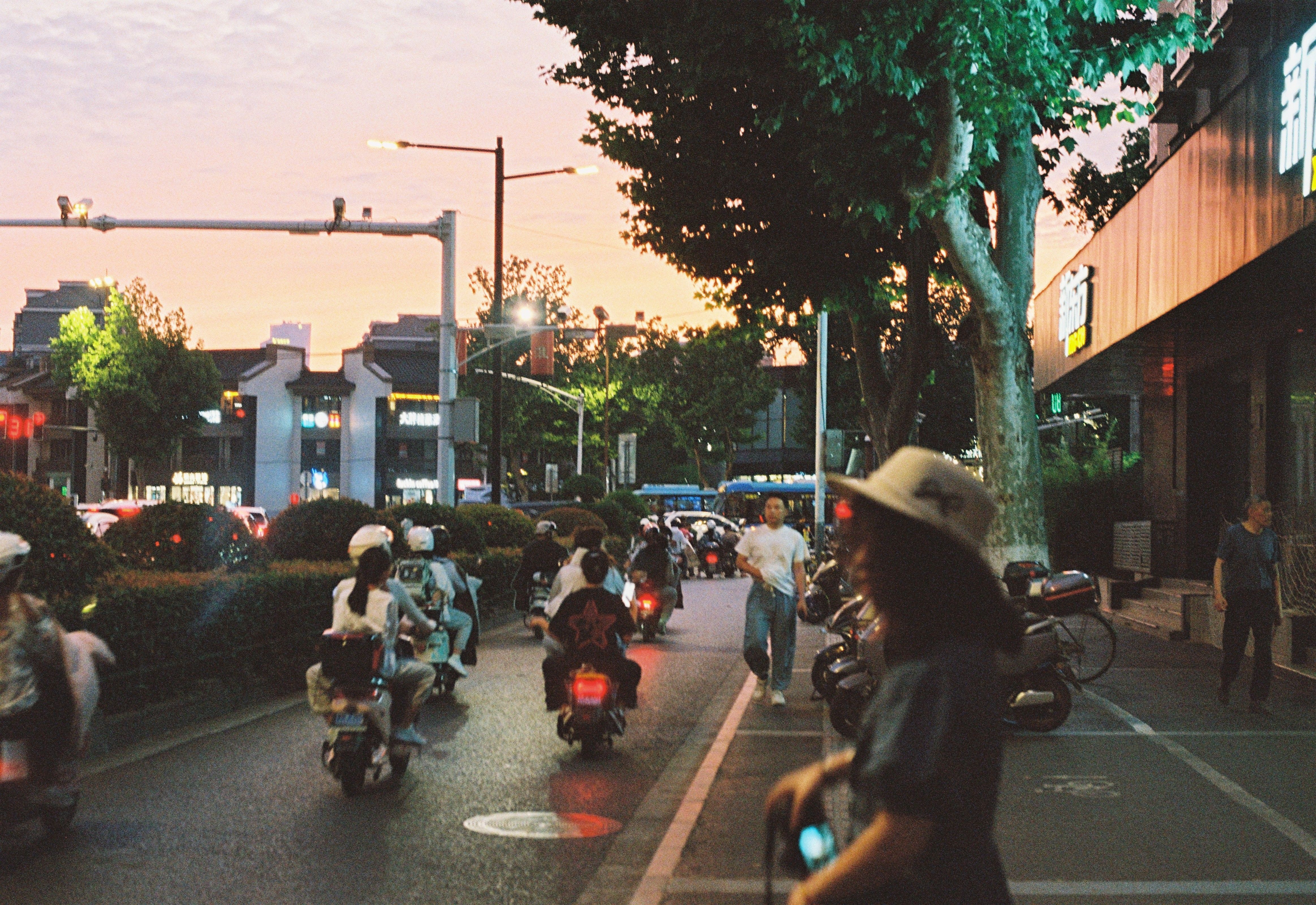 Film Photo of a Busy Street in a City at Sunset · Free Stock Photo