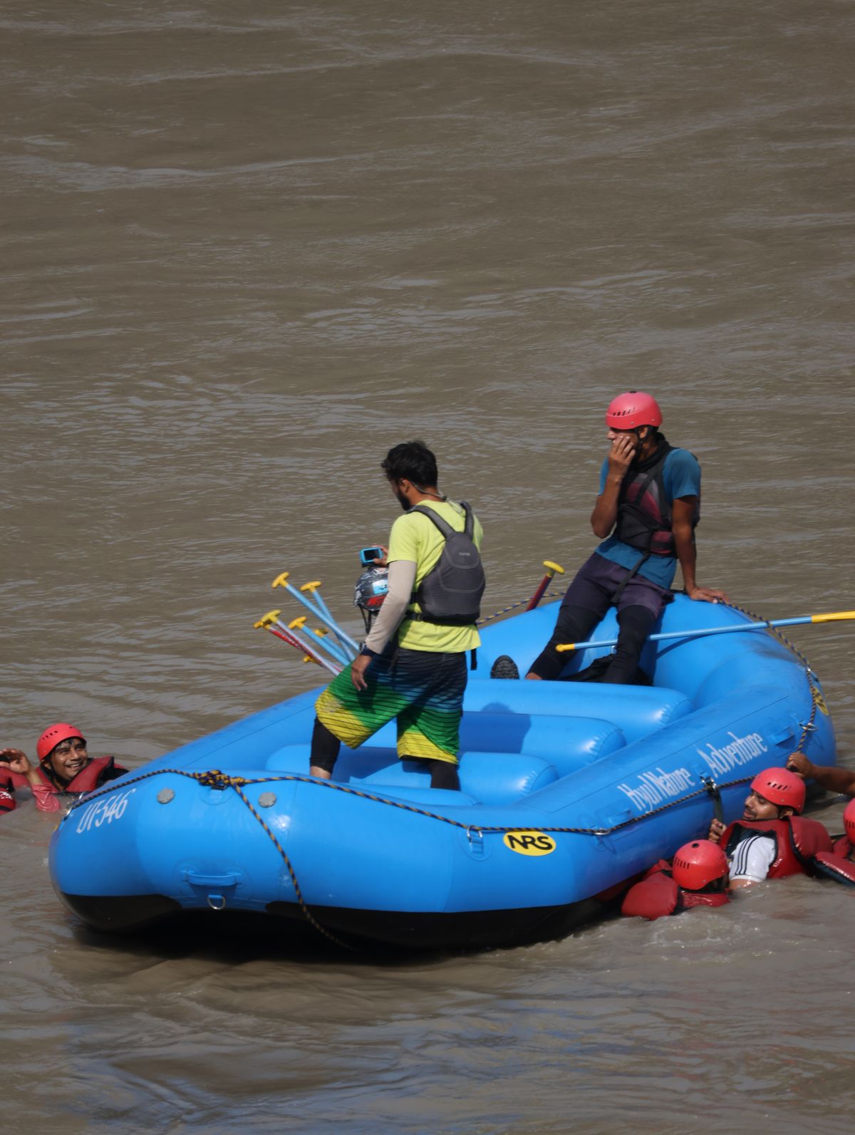 Family raft on calm river