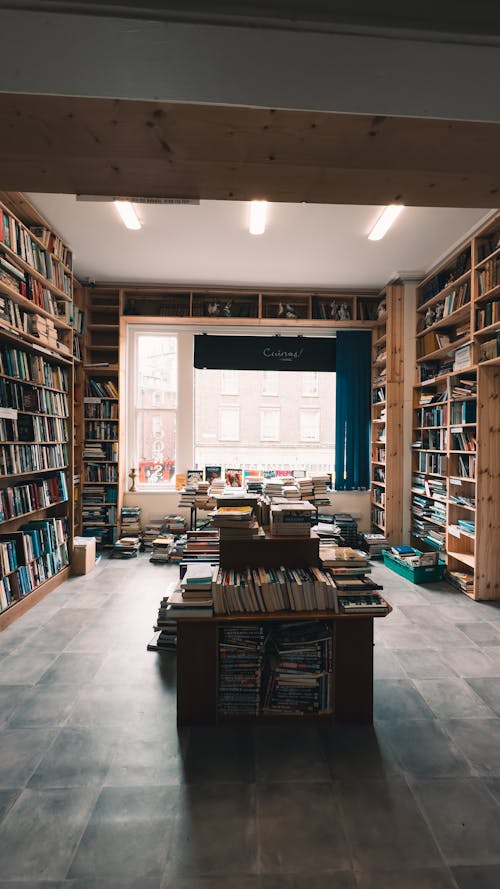A room with bookshelves and a window