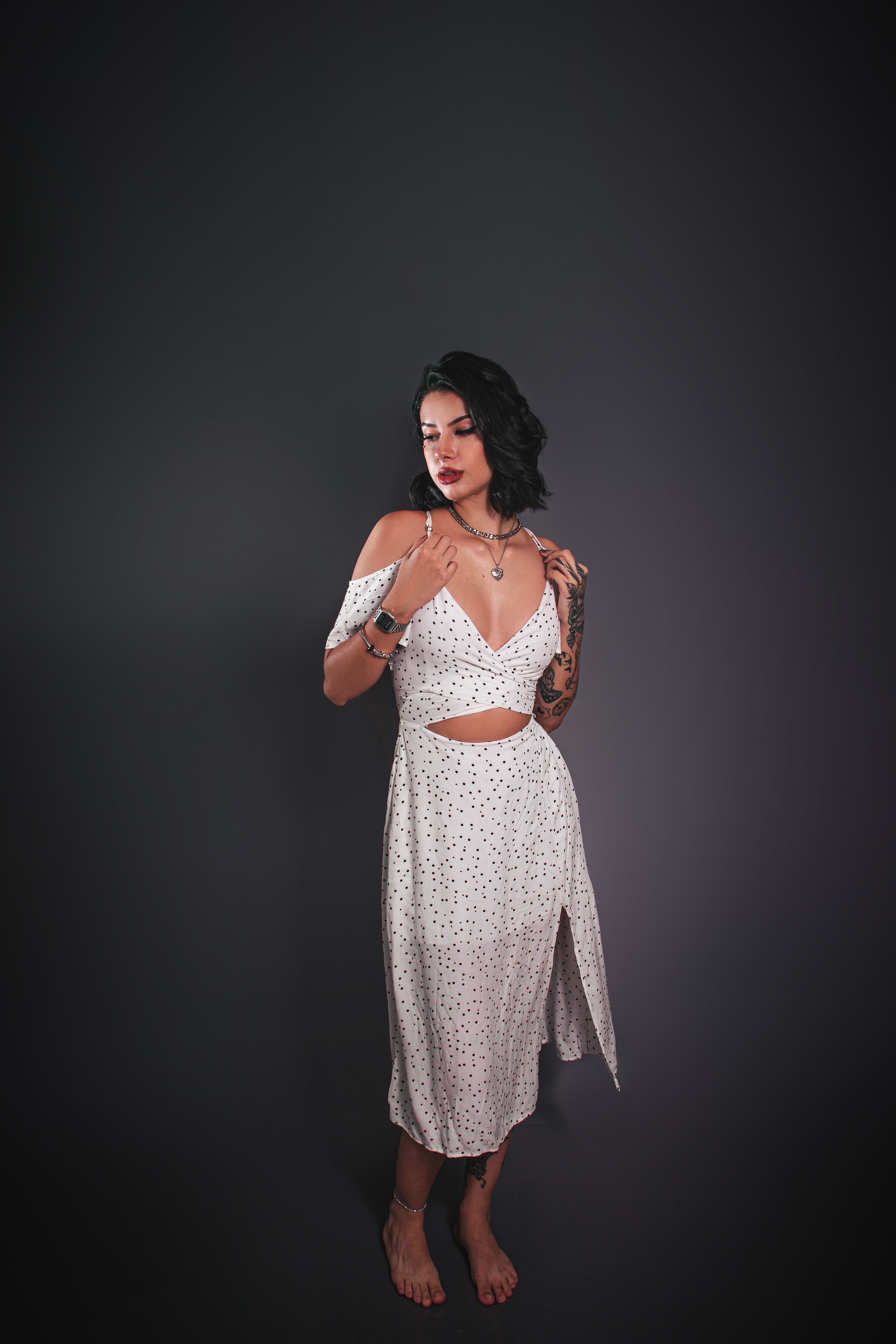 woman in low cut dress Low Cut Dress Plunging Neckline Urban House Fashion
