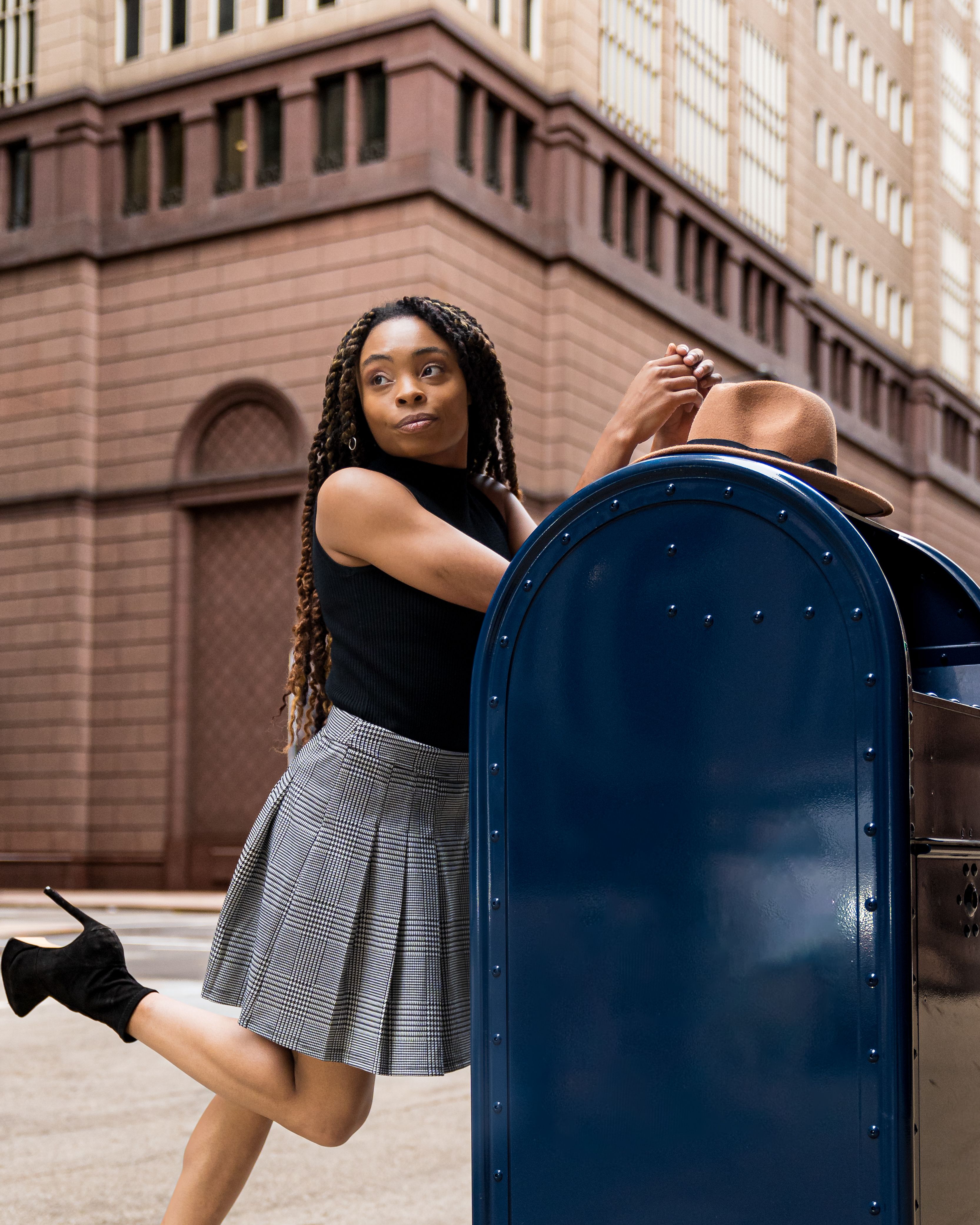 A Fashionable Woman Posing on the Street · Free Stock Photo