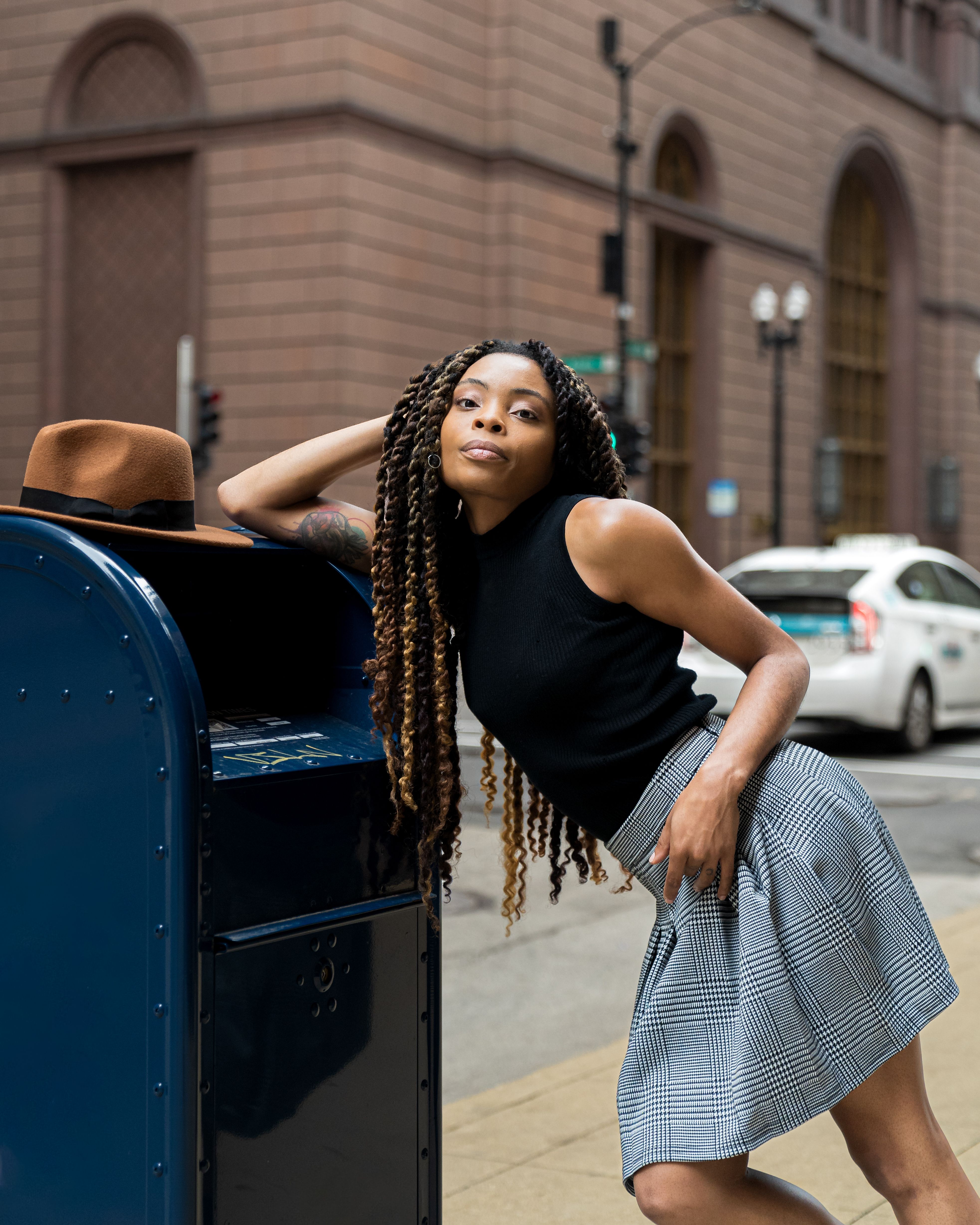 A Fashionable Woman Posing on the Street · Free Stock Photo