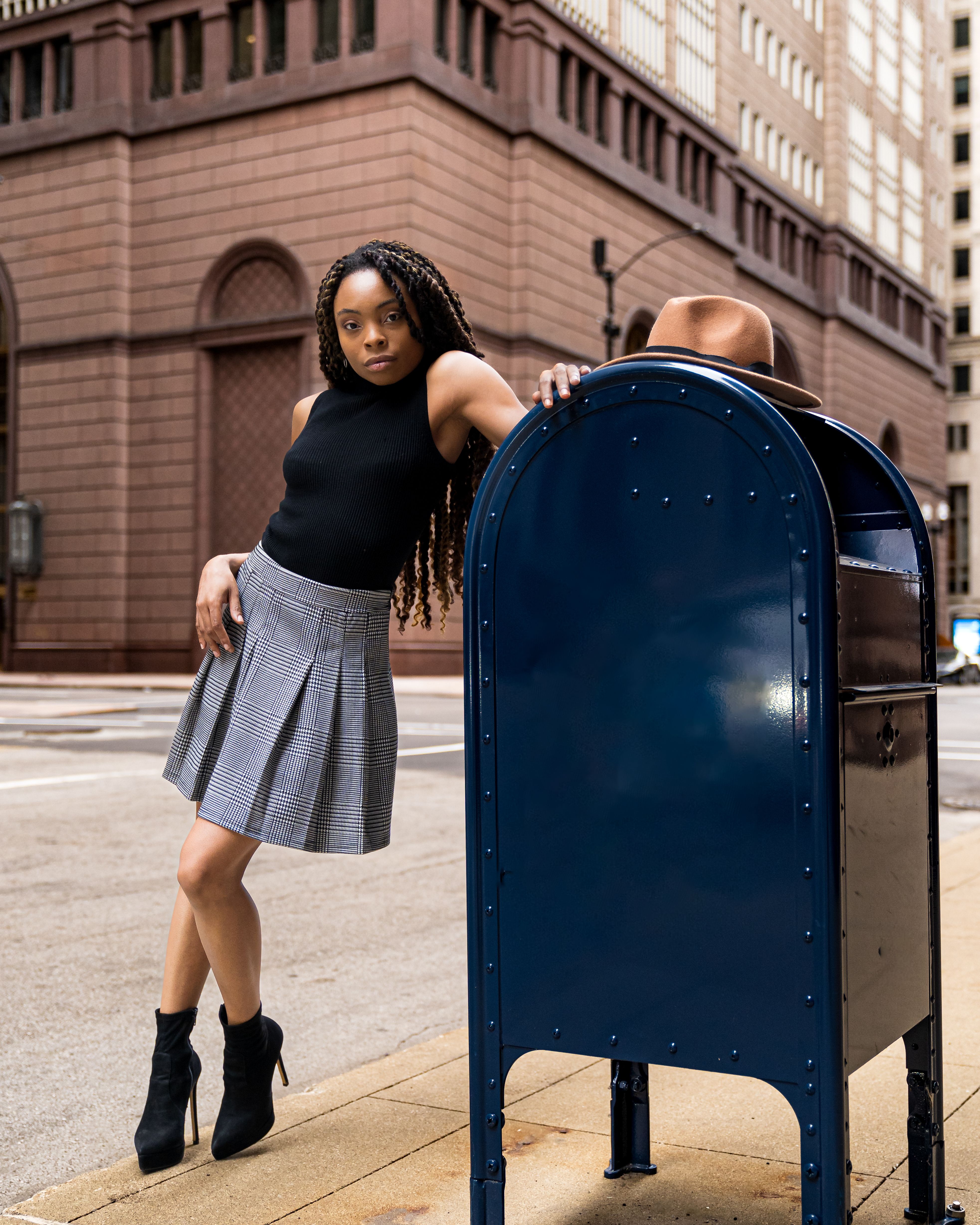 A Fashionable Woman Posing on the Street · Free Stock Photo
